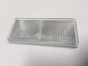 ODBLASK ASPOCK BIAŁY KLEJ 69X31,5MM