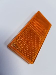 ODBLASK ASPOCK ŻÓŁTY KLEJ 69X31,5MM